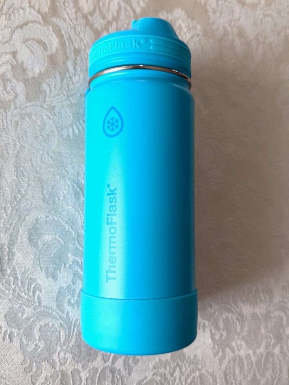 THERMOFLASK Stainless steel water bottle with straw, 16 ounce capacity